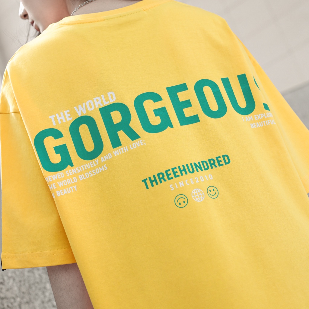 Áo Thun Vàng In Chữ The World Gorgeous Màu Xanh Chất Liệu 100% Cotton Form Rộng Thoải Mái Unisex Nam Nữ
