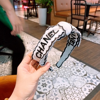 cài tóc nơ màu đen và trắng dành cho nữ