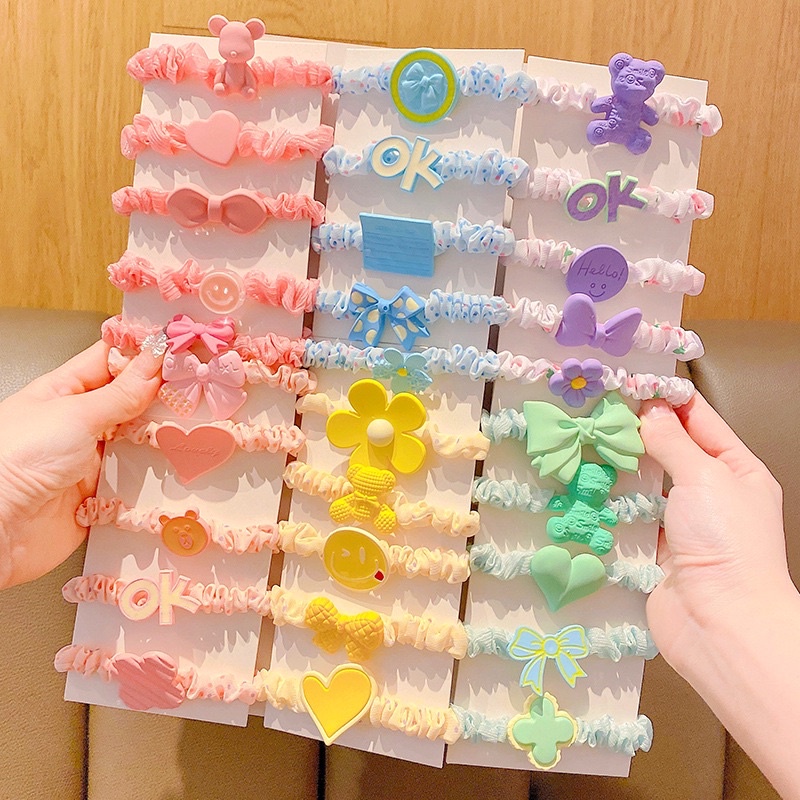 (Bán Buôn Sỉ) Set 5 chun buộc tóc gắn charm dễ thương