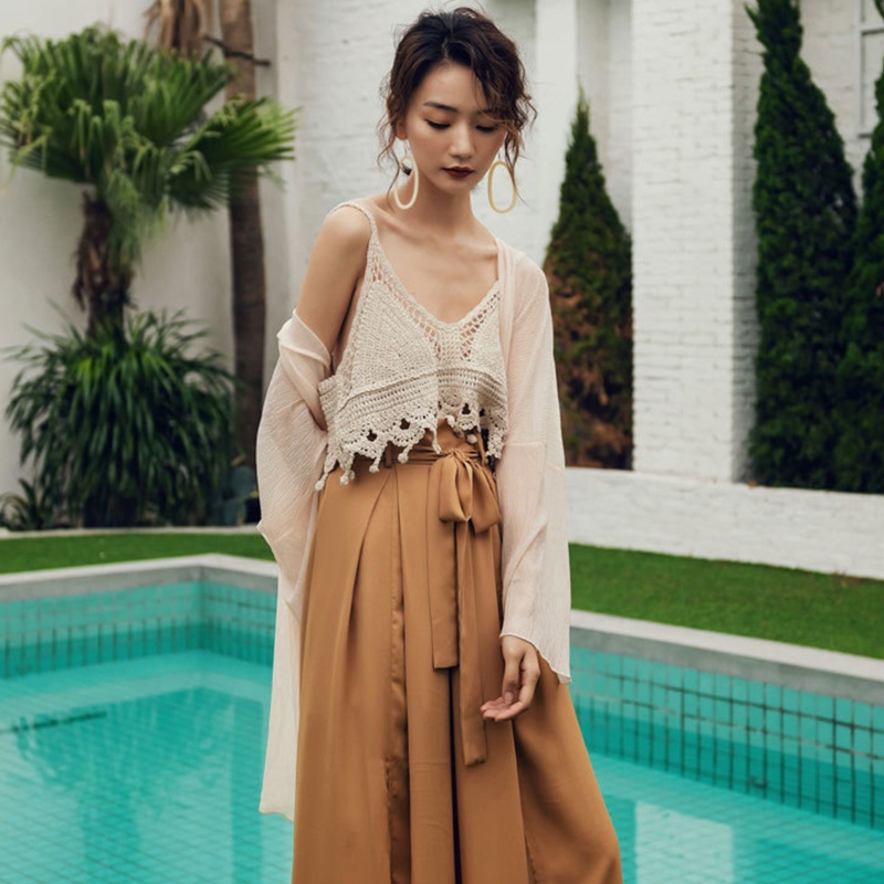 Áo Croptop Dệt Kim Cổ Chữ V Dáng Rộng Phối Tua Rua Thời Trang Đi Biển Cho Nữ
