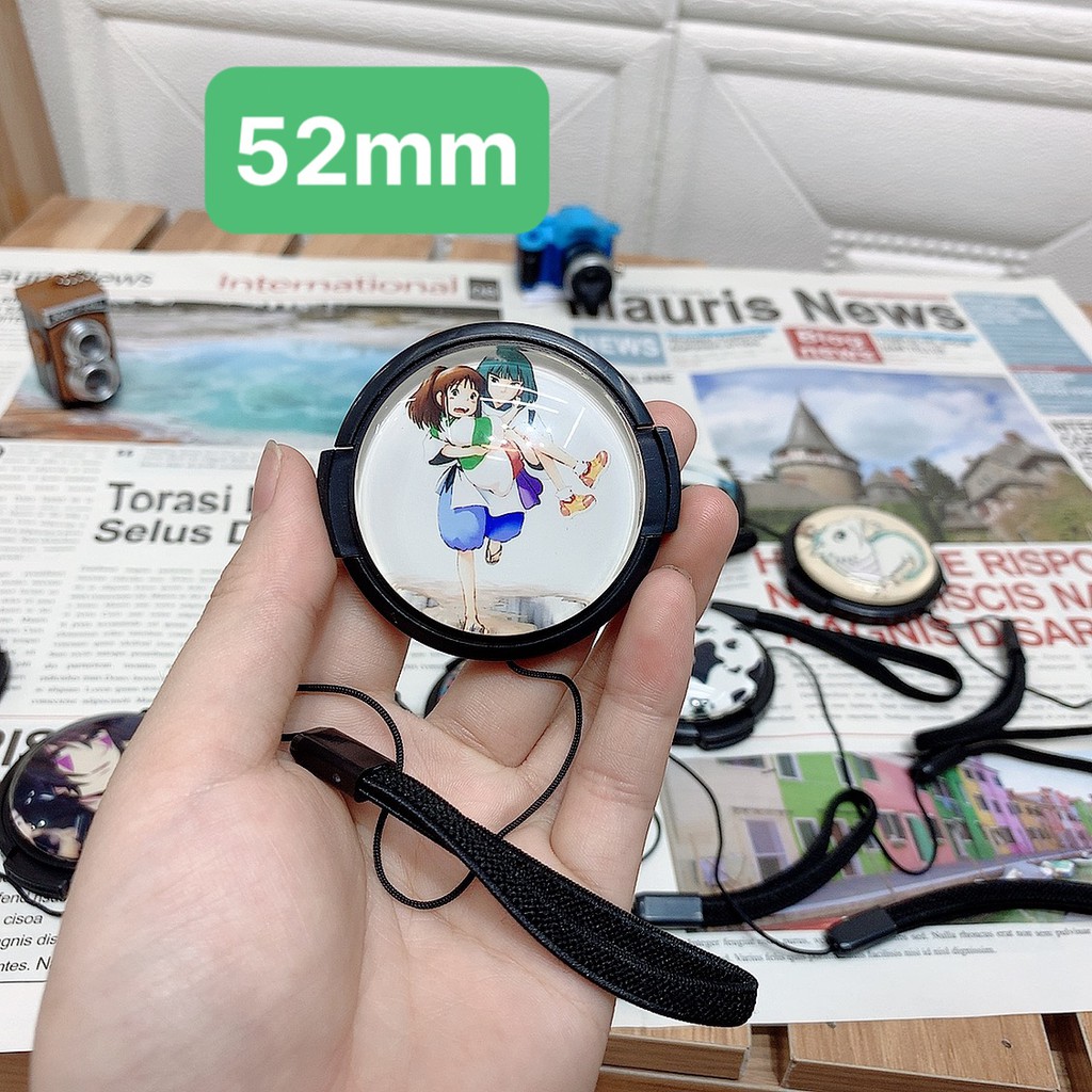 Nắp ống kính máy ảnh 40.5/52/58 (hình dễ thương) giao mẫu ngẫu nhiên 1M20