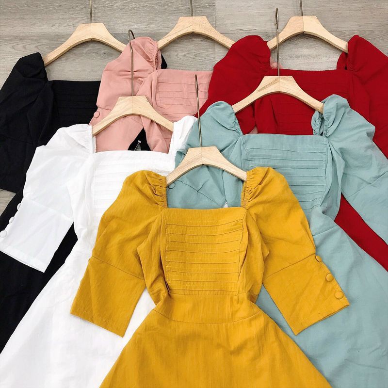 Đầm nút bọc tay phồng xép ly ngực mocking