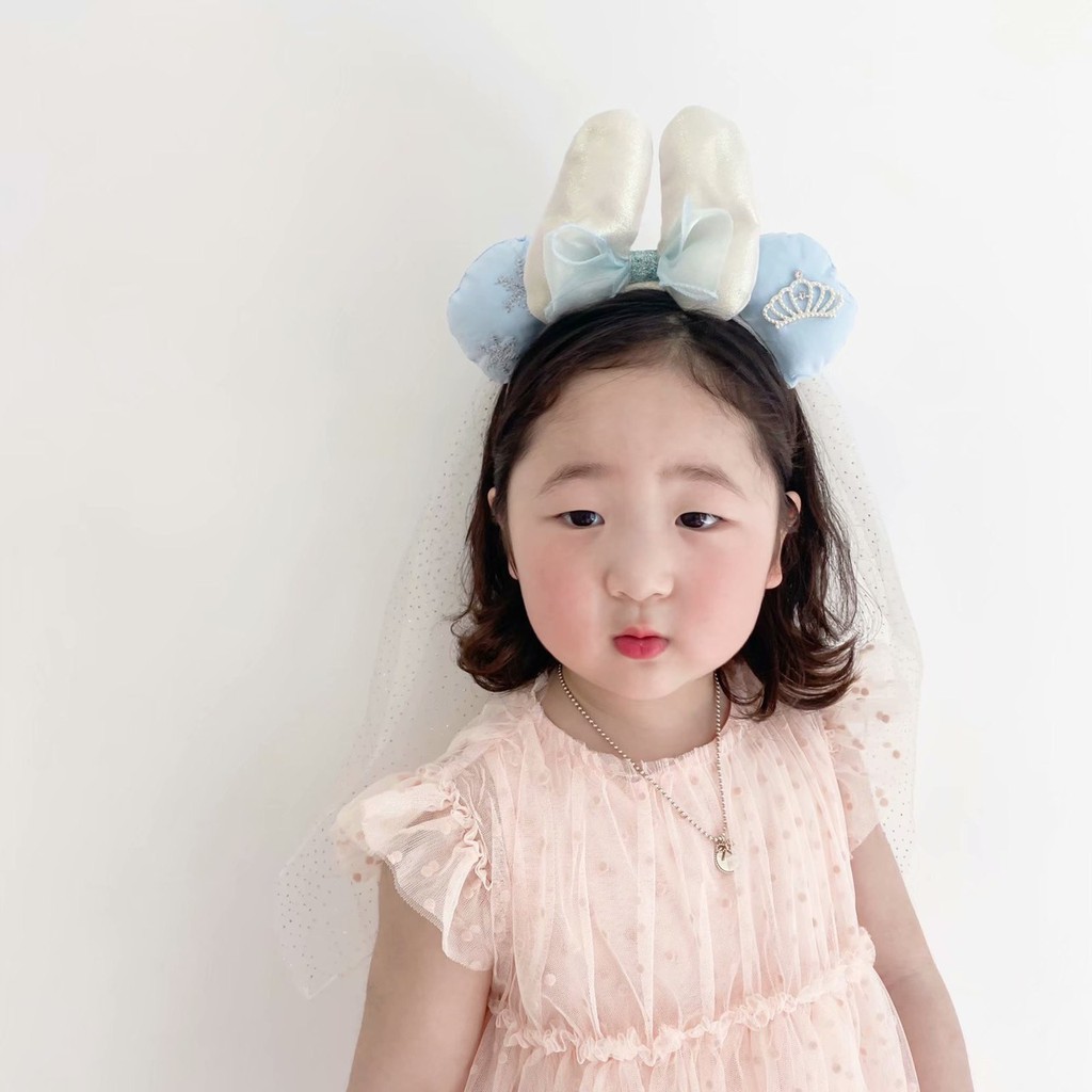 Cài nơ bạch tuyết cho bé