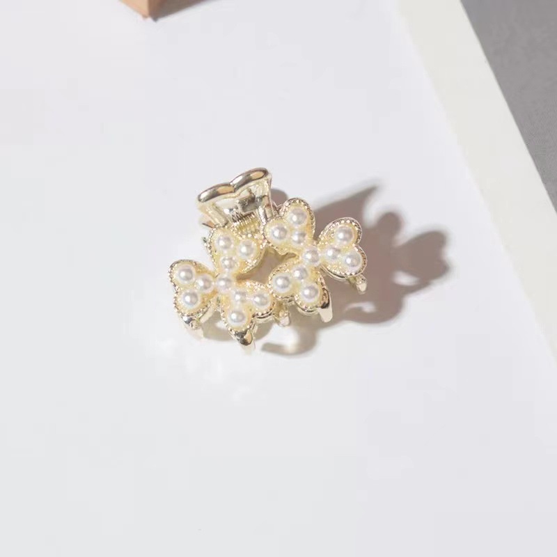 Kẹp tóc nơ đính ngọc trai dễ thương