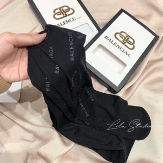 Quần tất Balenciaga
