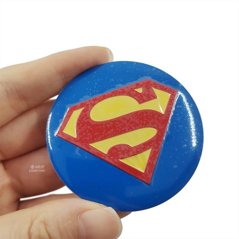 Miếng dán trang trí bánh xe hình logo siêu nhân kích thước 4x56mm