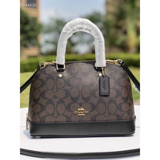 Túi Coach hến da thật pha pu canvas