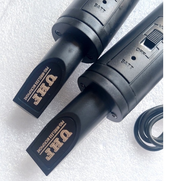 Mic đa năng Q_333 không dây 2 cây..." sóng U " ....độ xa 50m...hàng mẫu mới.