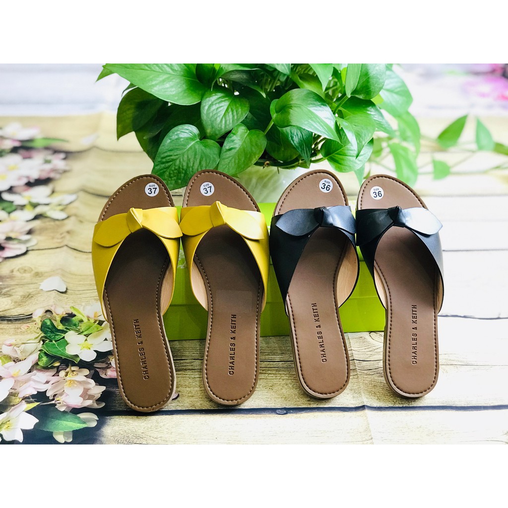 Dép nữ bệt đính nơ xinh xinh.