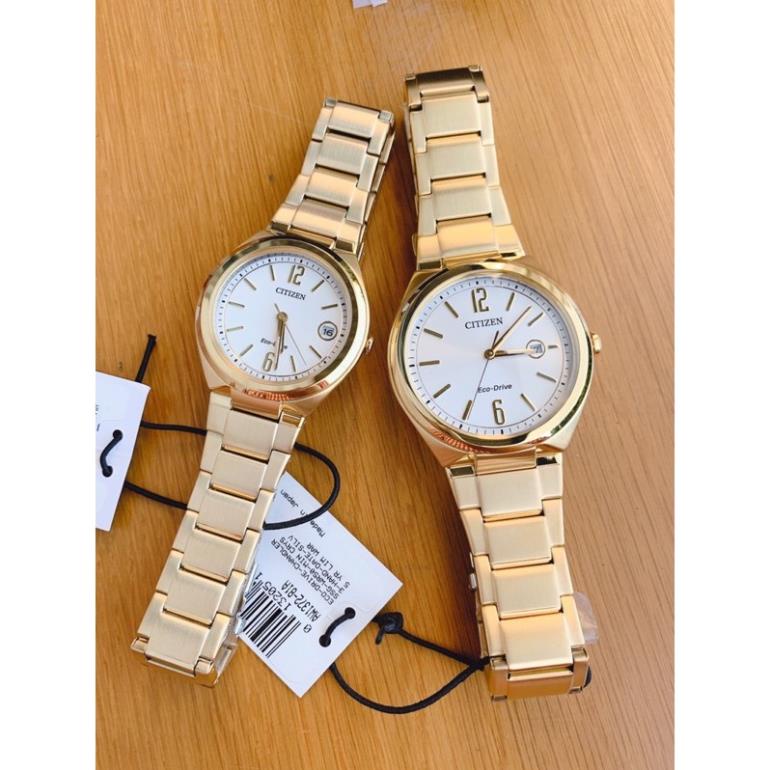 Đồng hồ cặp Citizen Eco-Drive Mens Date Arabic Gold-Tone Aw1372-81A - FE6022-85A Dây gold sang trọng