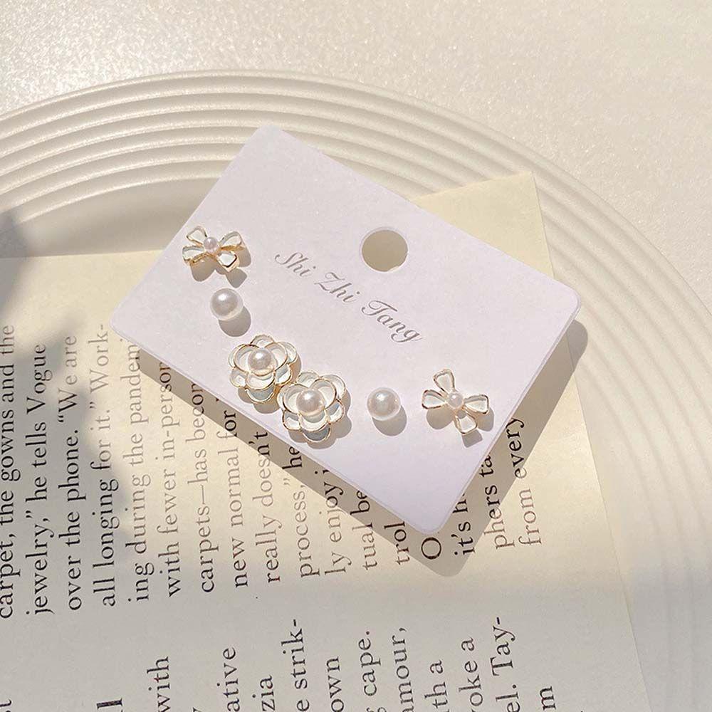 Bông Tai Hình Hoa Trà Thắt Nơ Xinh Xắn Cho Nữ