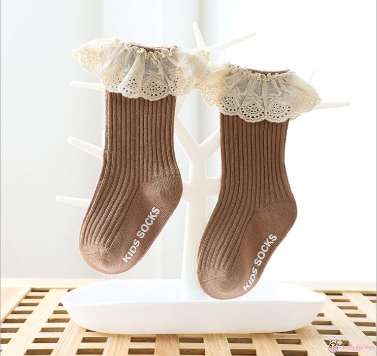 Tất dệt kim bằng vải gân màu trơn chống trượt phối ren gợn sóng ở viền cổ cho bé gái
