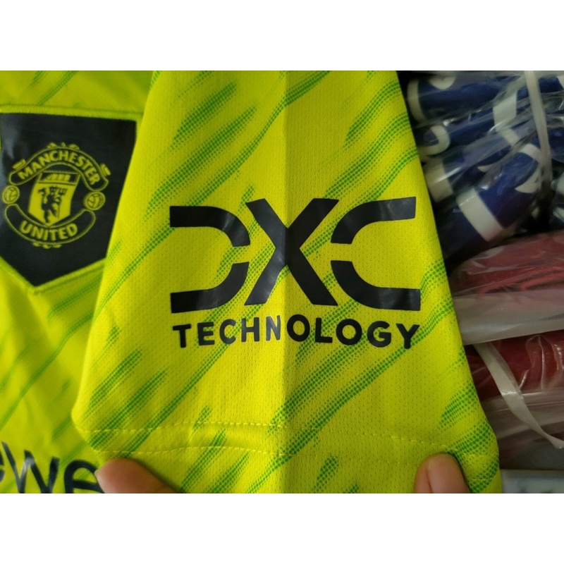 Quần áo bóng đá MU thái màu Xanh chuối bản fan - logo thêu