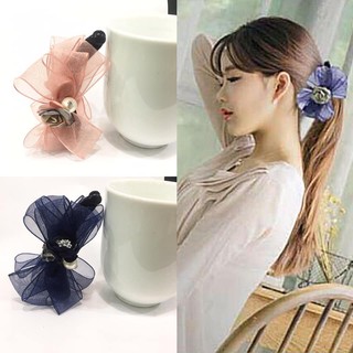 Cặp dọc nơ tạo phồng chân tóc
