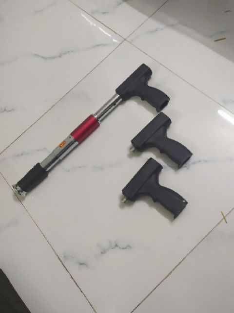 Tay cầm máy bắn ty