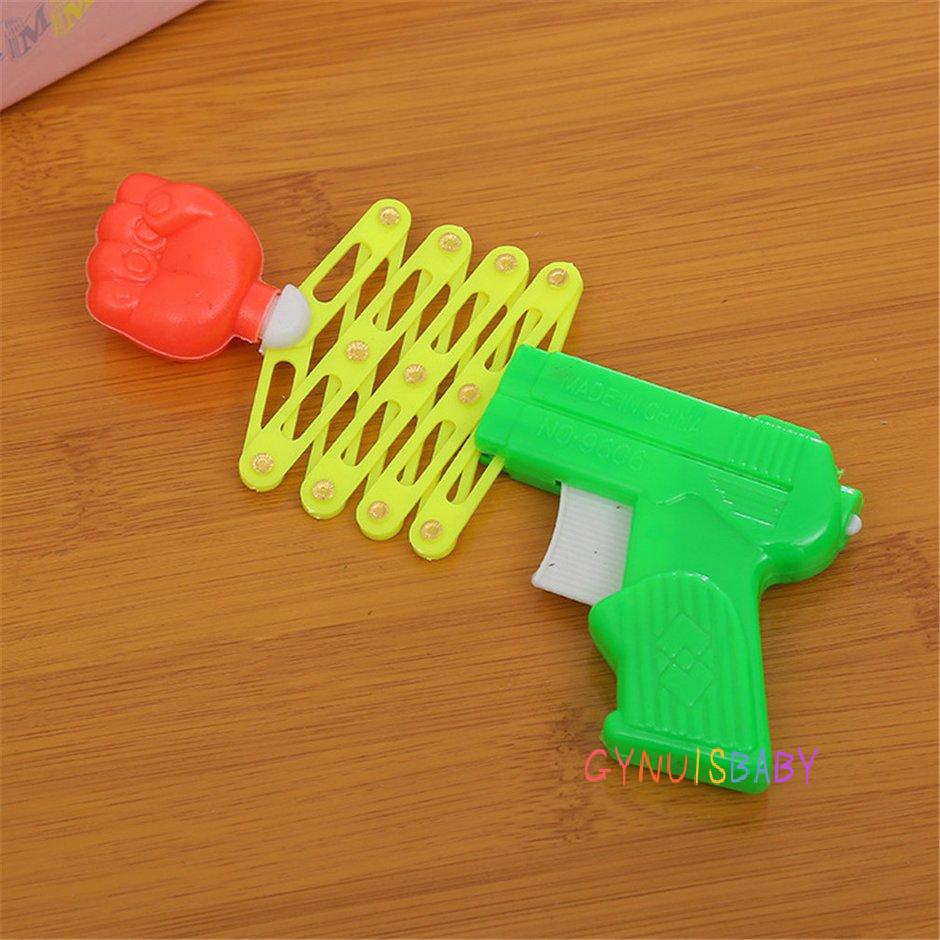 Retractable Fist Shooter Trick Toy Kids Gift Elastic Telescopic Fist