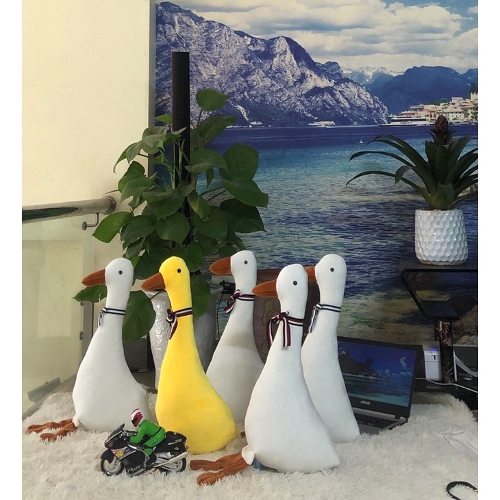 Gấu bông gối ôm hình con vịt dài 65cm cute đáng yêu co dãn 4 chiều