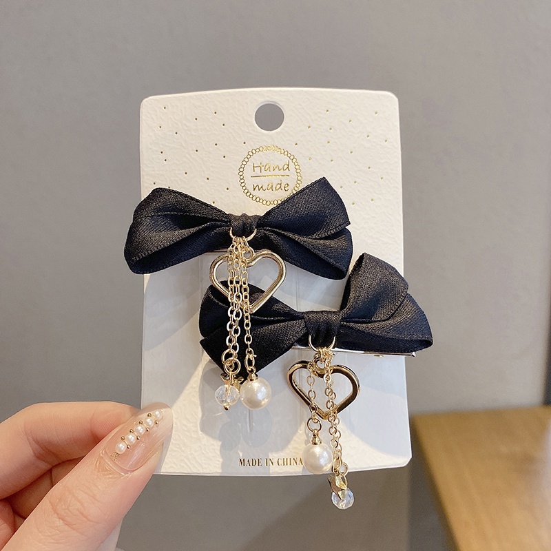 ✨✨Set 2 Kẹp Tóc Nơ Tua Rua Đính Ngọc Trai Giả Mừng Năm Mới