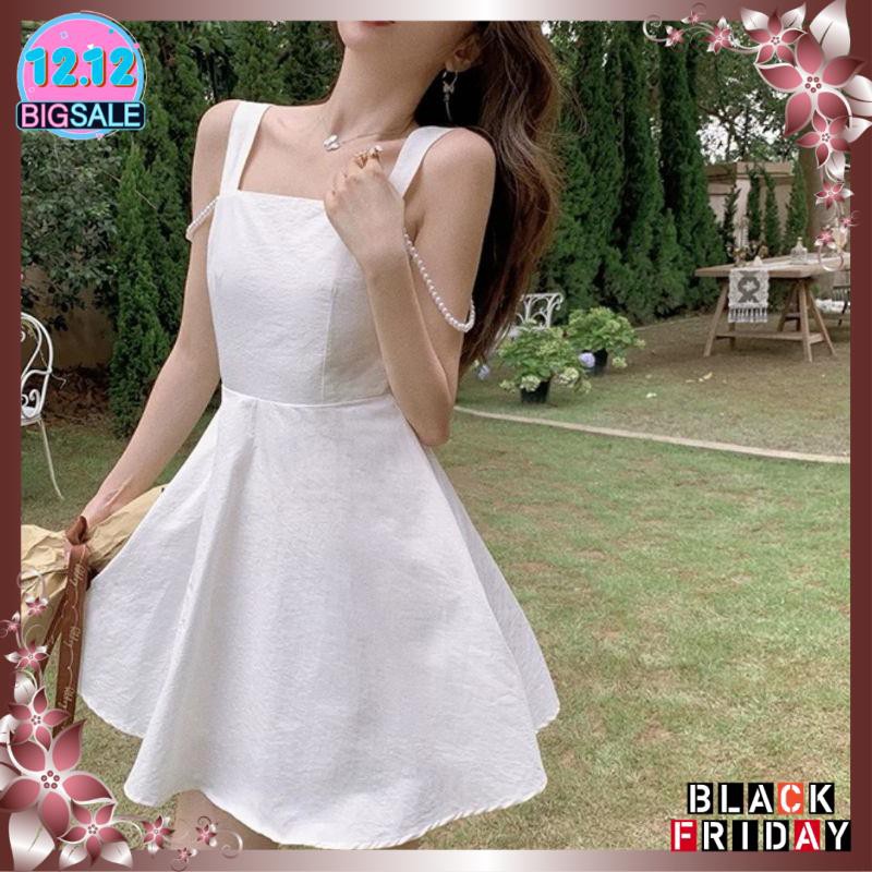 Đầm trắng hở lưng cột nơ dây chuỗi nhẹ nhàng xinh xắn | BigBuy360 - bigbuy360.vn