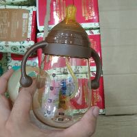 Bình sữa gấu ( tặng 2 núm ti + bộ cọ 5 món )