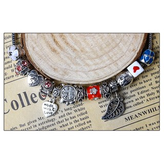 Vòng tay charm đồng hồ và chiếc lá