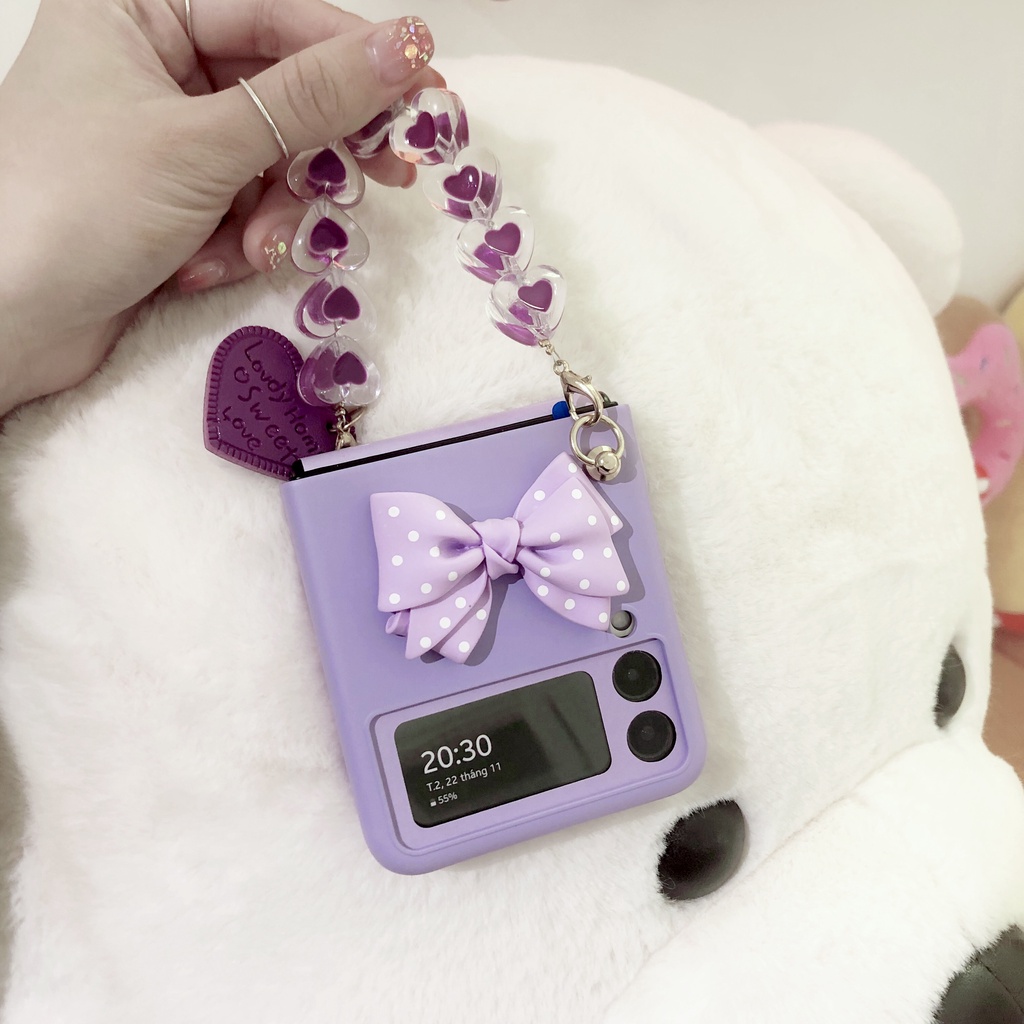 Ốp Samsung Z Flip3 / ZFlip3 / Z Flip4/ ZFlip4 đính nơ có dây xách xinh xắn (2 màu)