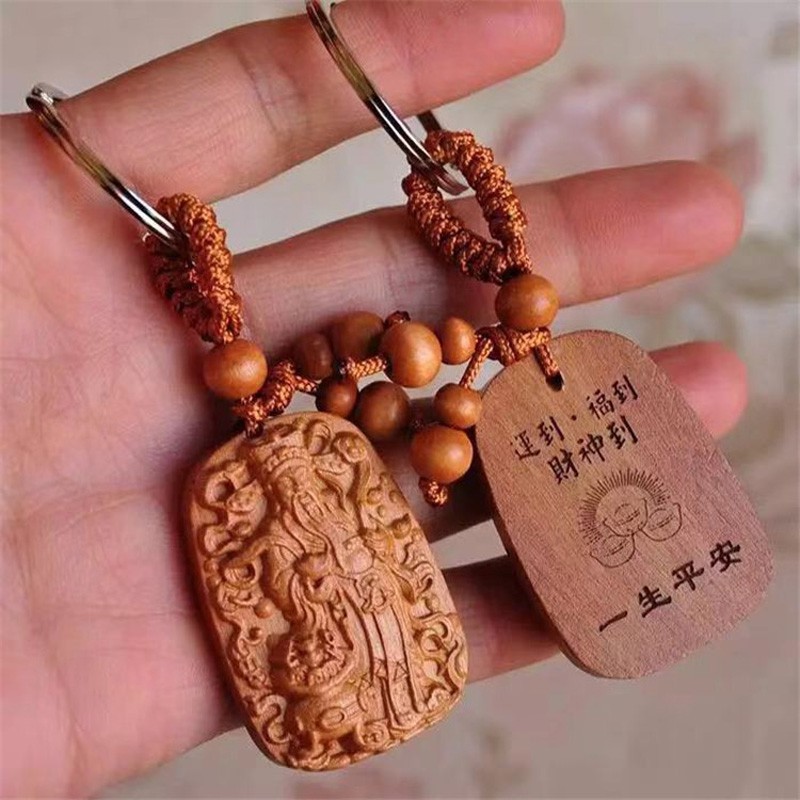 Móc khóa Tượng Thần Tài gỗ đào đuổi tà khí xua tan tai họa