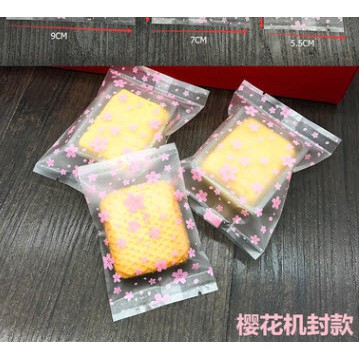 Túi đựng bánh cookie, bánh trung thu 50gr 10cm*7cm hoa anh đào (100 chiếc ) còn mẫu trong