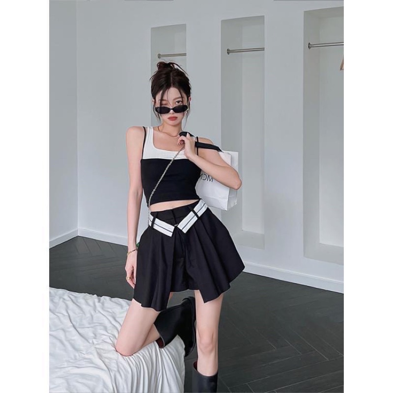 Set áo đôi croptop và chân váy xếp xẻ tà đai nổi