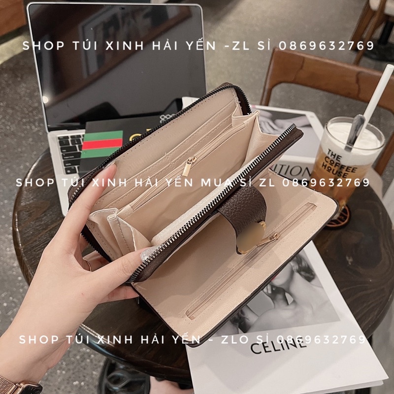 Ví dài cầm tay thời trang, tiện dụng lắp bấm logo hoạ tiến kể sọc giữ