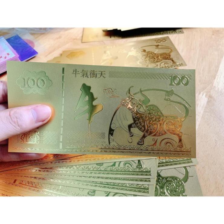 Tiền Con Trâu Macao Vàng Lì Xì Tết 2021 - Tien 100 Macao Plastic Vang Li Xi Tet