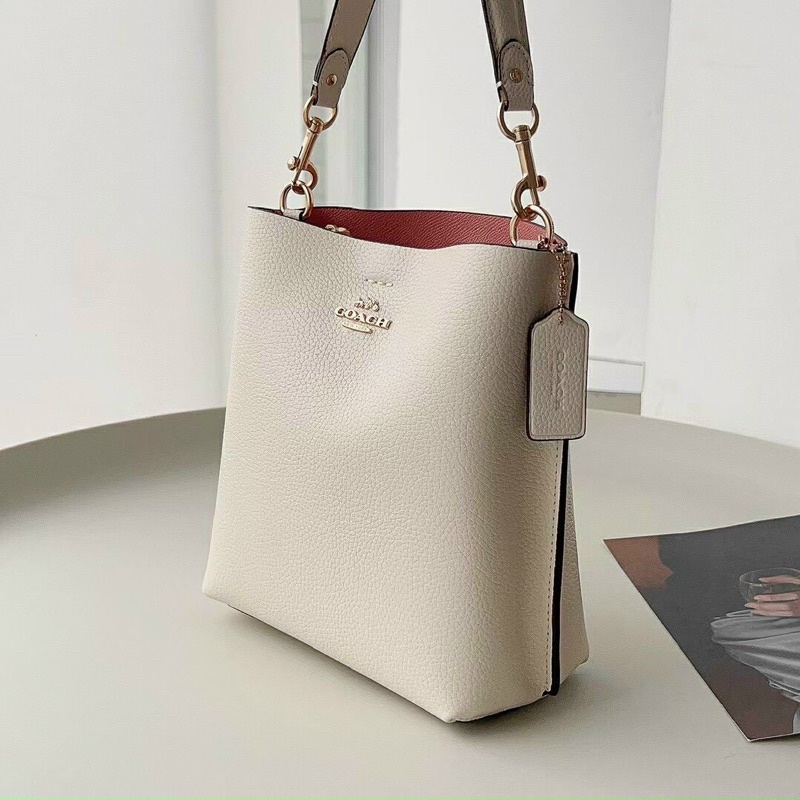 Túi co ach bucket mollie