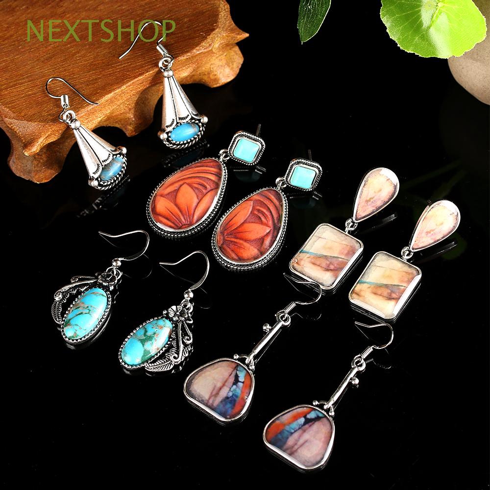 Khuyên tai handmade đính đá ngọc lam phong cách Tây Tạng