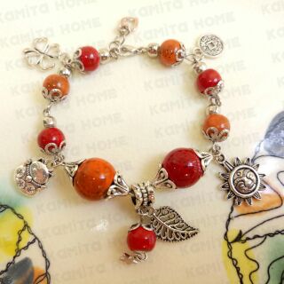 Vòng hạt gốm mix charm