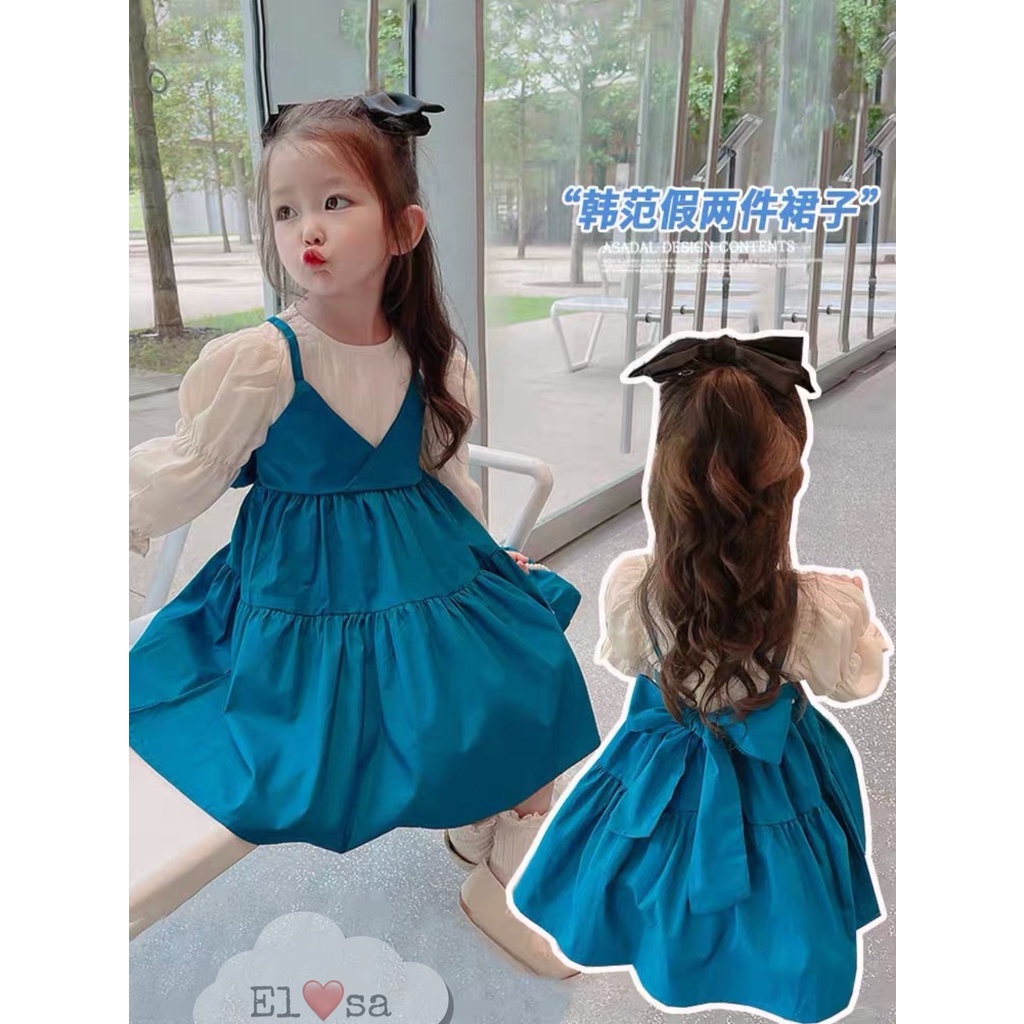 Váy bé gái dài tay dây yếm liền áo trắng nơ lưng 2 mầu Xanh Vàng 8-35kg XHN1057