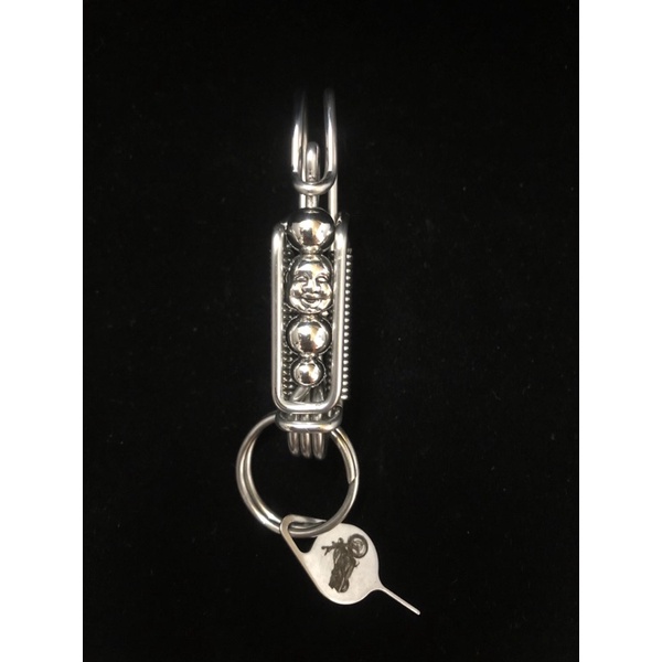 Móc khoá inox thần tài gõ cửa