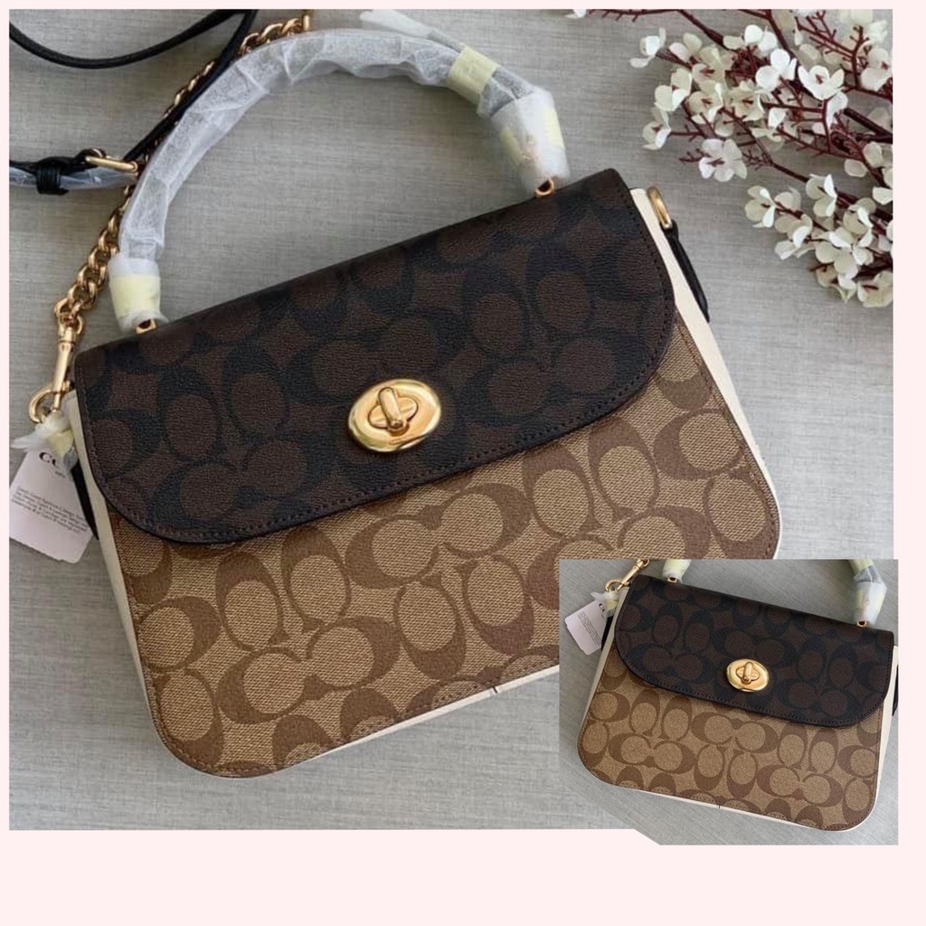 MIẾNG DÁN KHÓA TÚI COACH