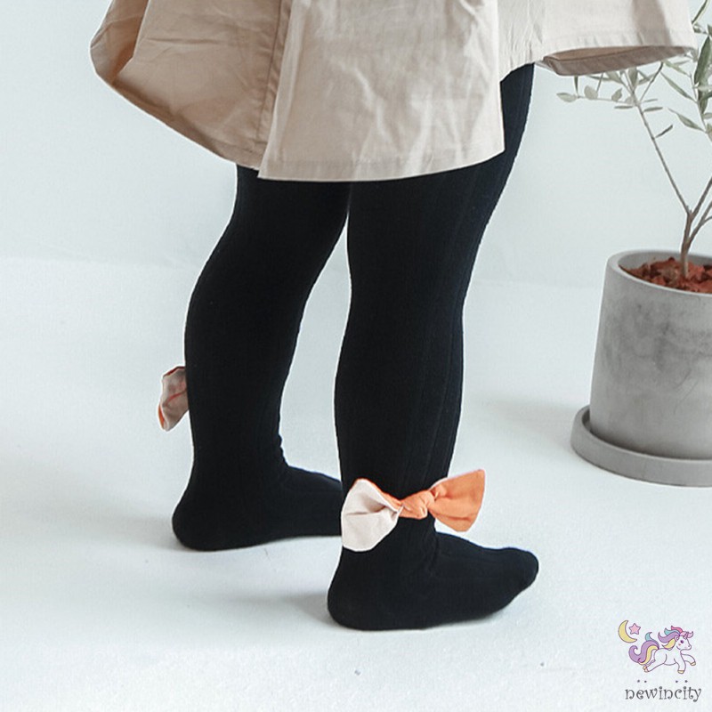 Quần legging phối nơ phong cách thời trang tinh tế cho bé gái