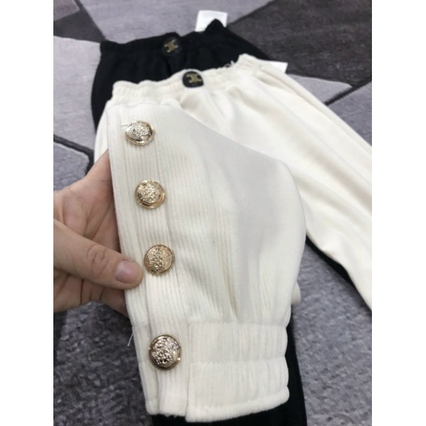 Quần nhung bom cúc đính gấu