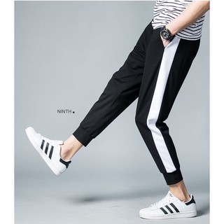 QUẦN THỂ THAO PHỐI SỌC TRẮNG BÓ ỐNG, CHẤT THUN THỜI TRANG BTQ43
