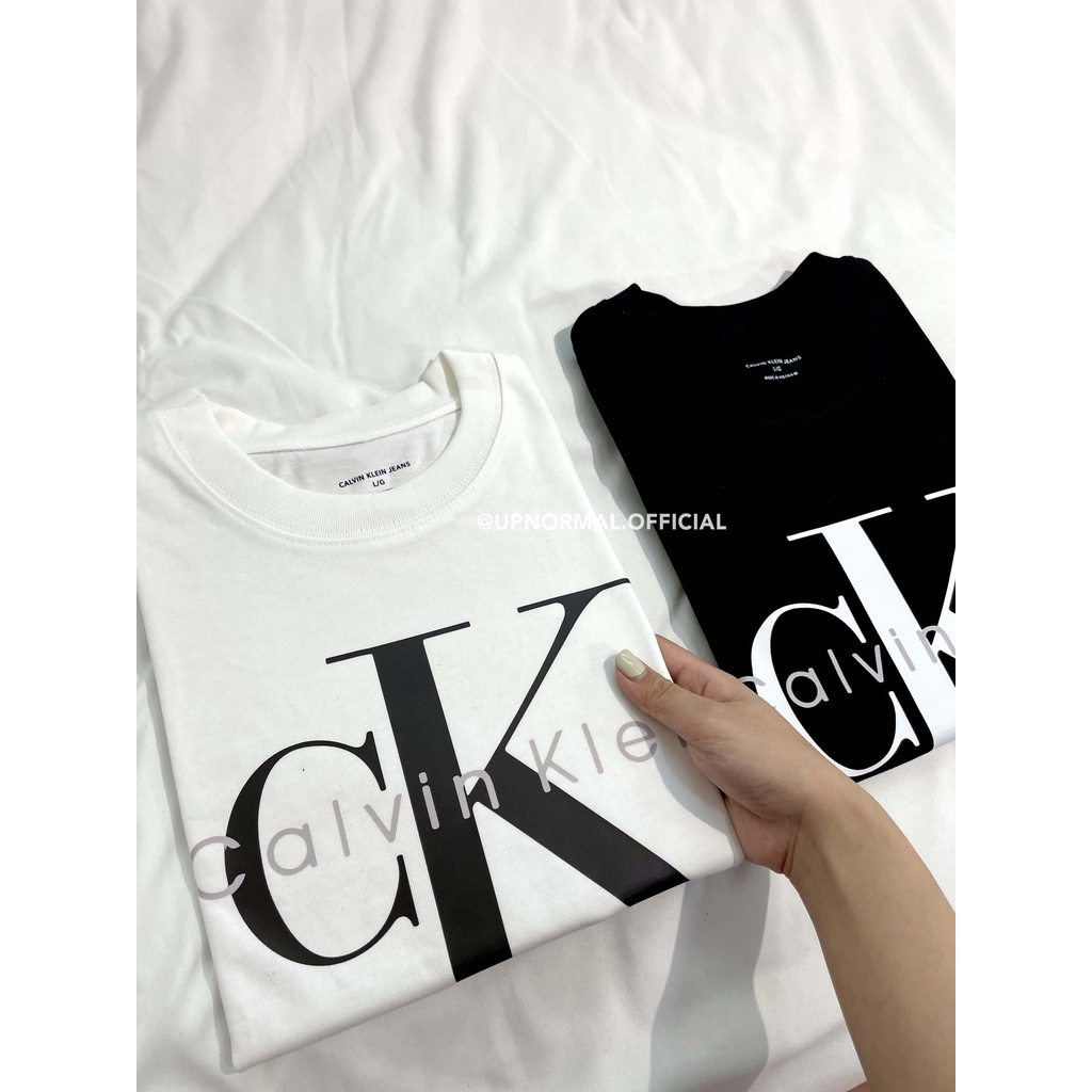 Áo thun CK form rộng tay lỡ unisex cho nam và nữ