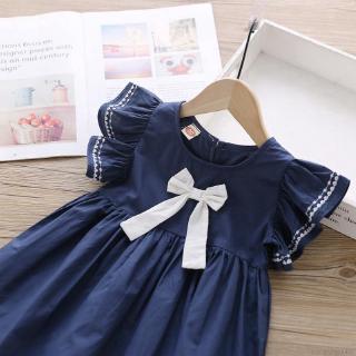 Đầm bé gái thắt nơ eo