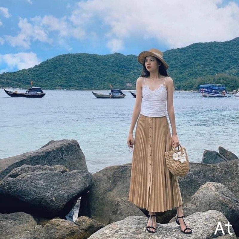 CHÂN VÁY MIDI BE KHUY GỖ