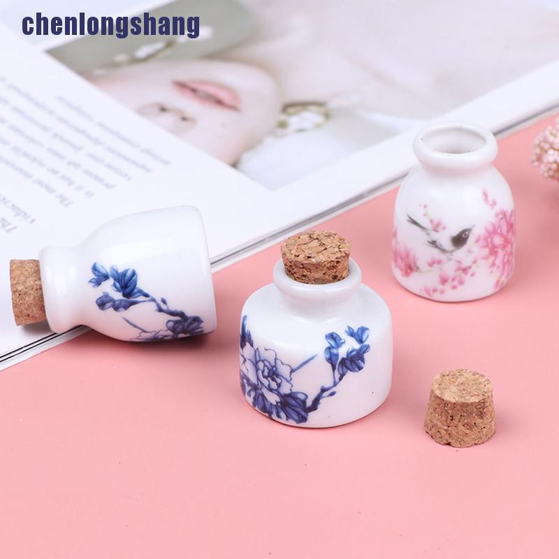 Chai bằng gốm sứ thủy tinh để đựng chất lỏng có nút bần bằng gỗ tiện dụng