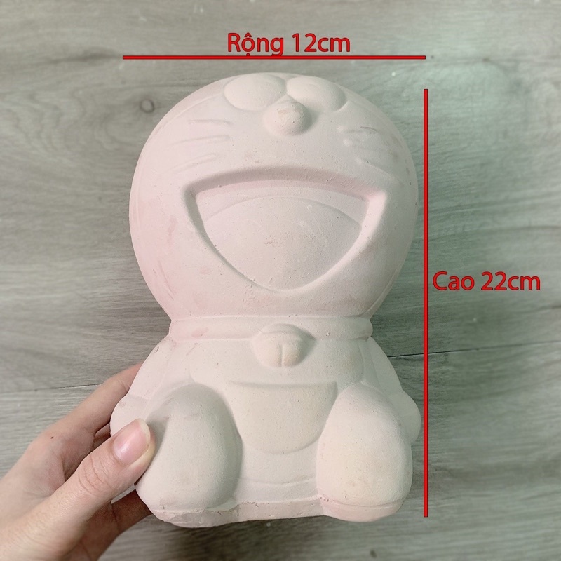 Tượng tô có lỗ bỏ tiêt kiệm tiền, heo đất chưa tô hình đôremon