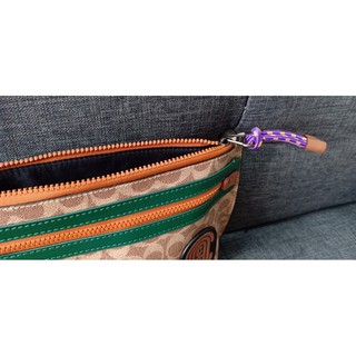 Túi Coach Clutch