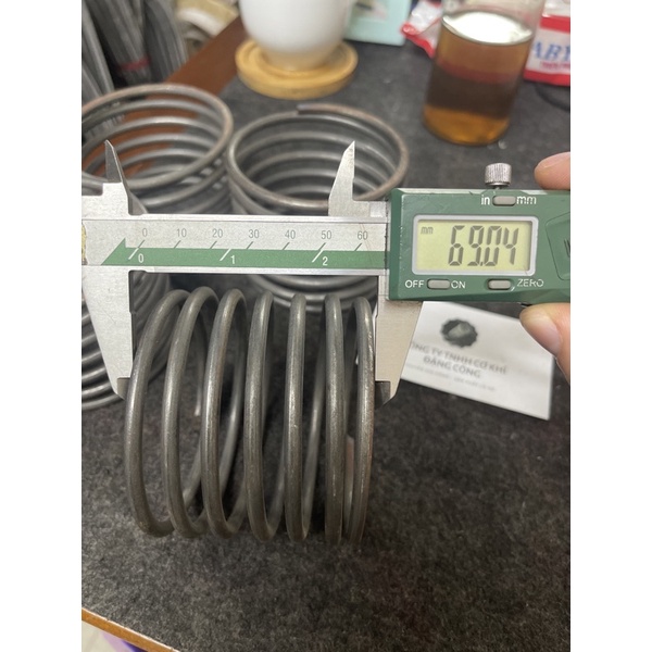 Lò Xo Nén phi ngoài 85 sợi 5 cao 69-70mm