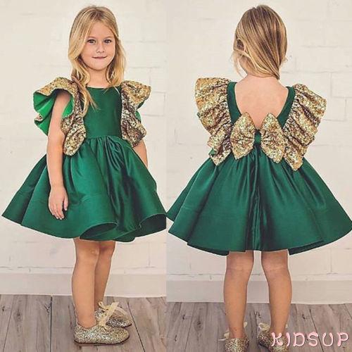 Đầm xòe tay cánh tiên đính nơ và kim sa đáng yêu cho bé gái