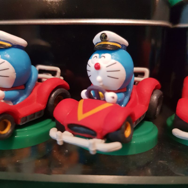 mô hình đế xanh mini chính hãng nhật doraemon chạy xe