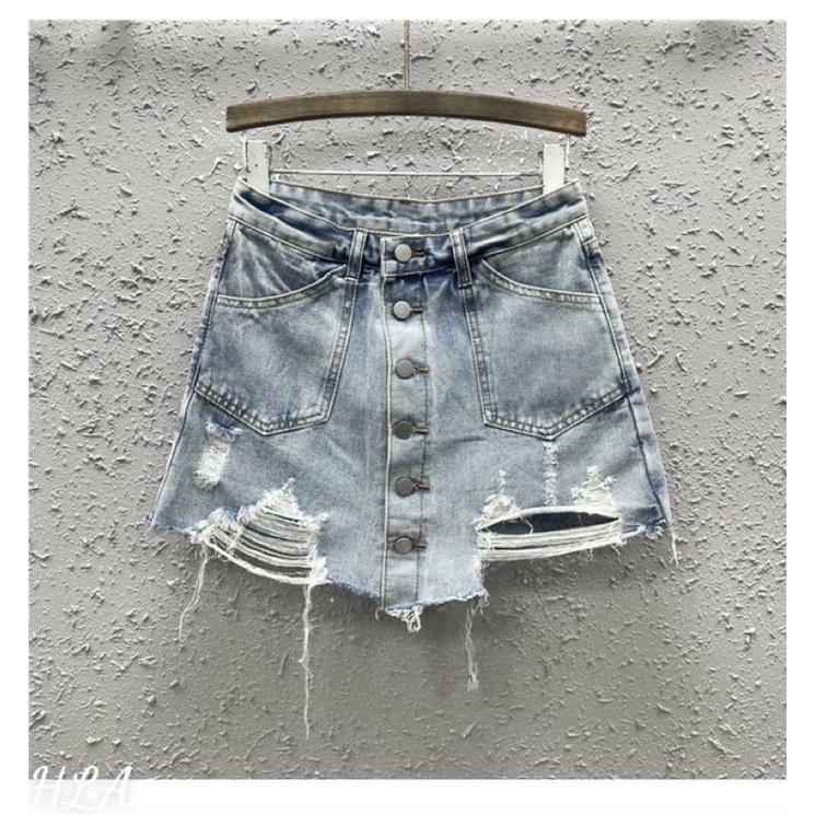 Quần jeans rách giả váy khuy dọc